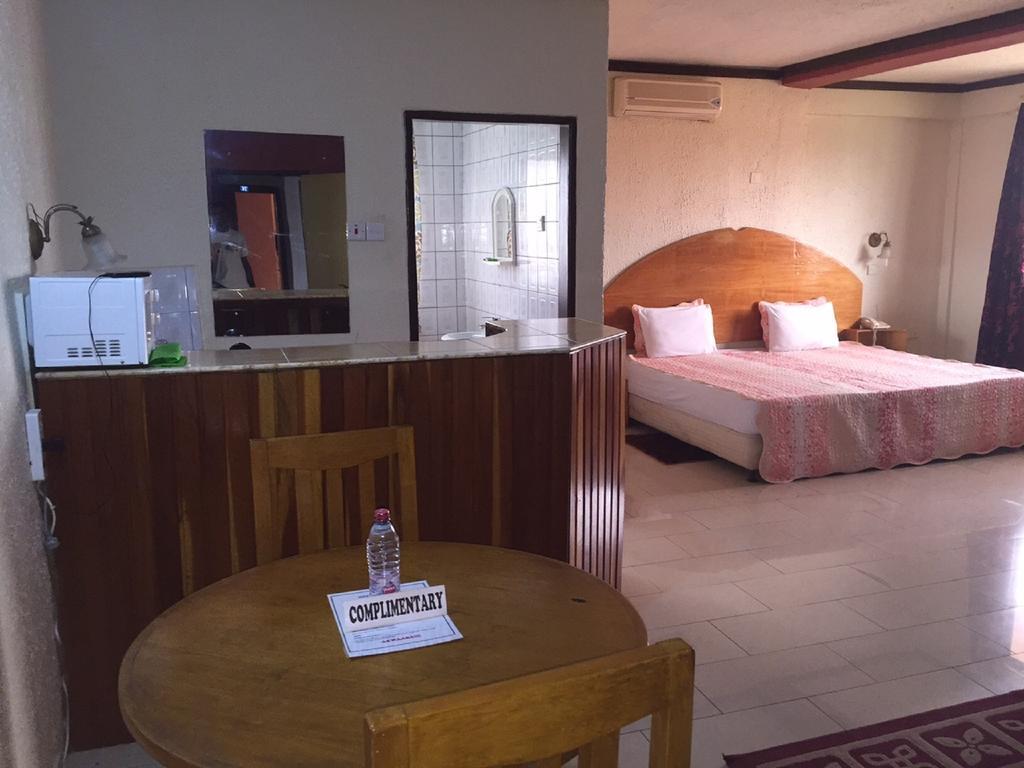 Hotel De Texas Kumasi Habitación foto